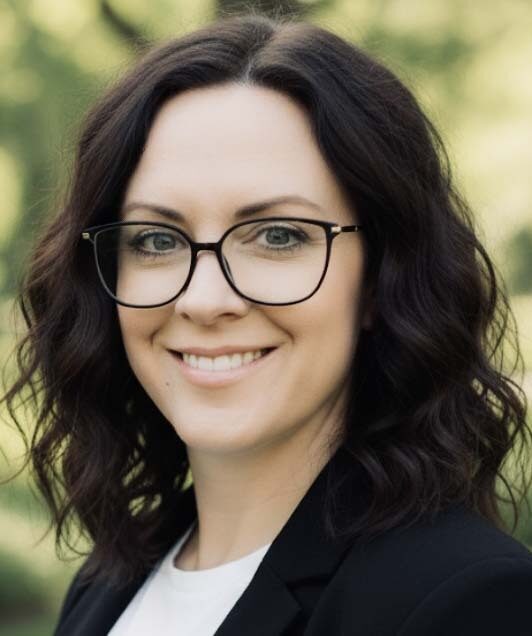 Wall Residences IT Director Connie Littles standing outside